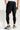 Short noir de running pour homme avec legging intégré, coupe ajustée, conçu pour performance et confort.