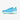 Chaussure de basketball Anta bleue et turquoise pour homme, avec semelle blanche et motifs tribaux, offrant un style frais et dynamique sur le terrain.