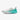 Chaussures de running Anta blanches avec dégradé turquoise et semelle technique, offrant légèreté et performance.