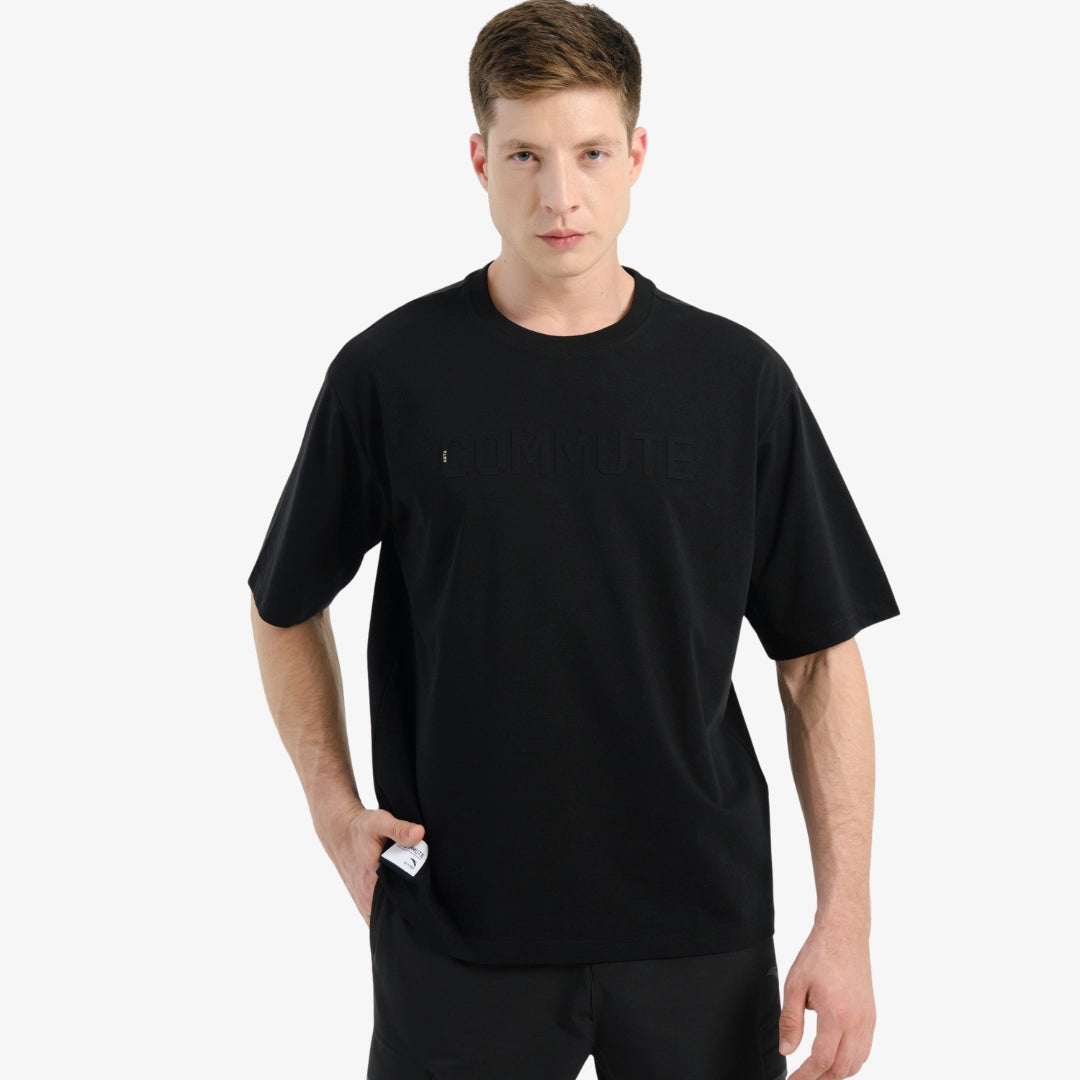 Men's black Anta Commute oversized T-shirt with minimal design, casual streetwear style