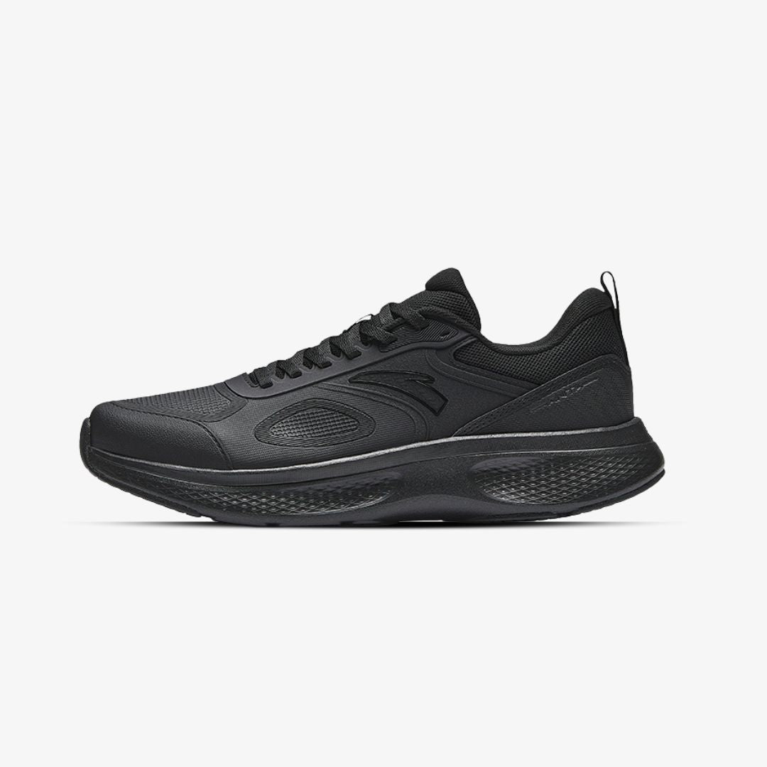 Side view of an all-black men’s training sneaker with synthetic and mesh upper, lightweight sole, and ergonomic design for walking, gym, or casual athletic use, photographed on a white background