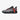 Chaussure de basketball noire avec motifs zébrés et détails rouges, lightweight design for agility and grip

