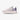 Sneaker Anta lifestyle beige avec empiècements violets et semelle épaisse.